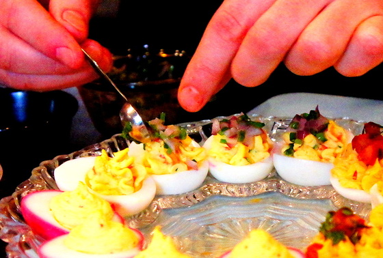 Garnishing deviled eggs.JPG